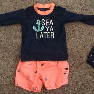 Baby boy Carter’s Swim Trunks and Rashguard